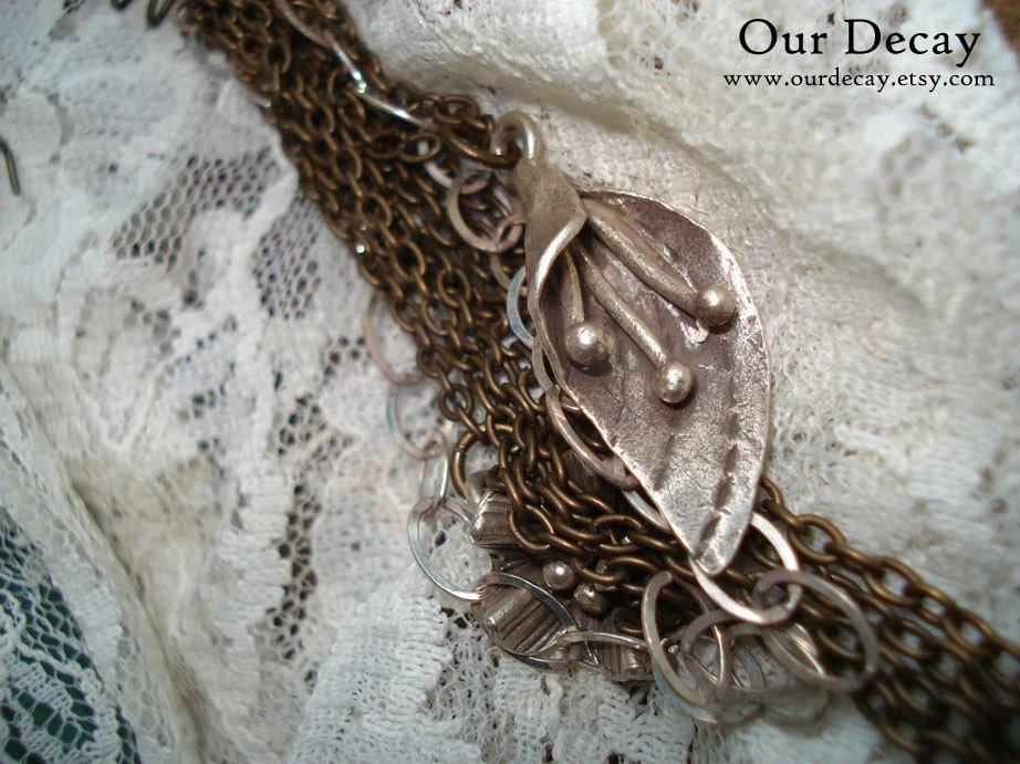 Winter Flora - mixed metal flower charm and chain earrings