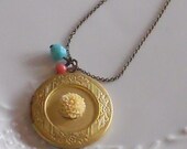 Vintage Brass Locket with Cream Flower