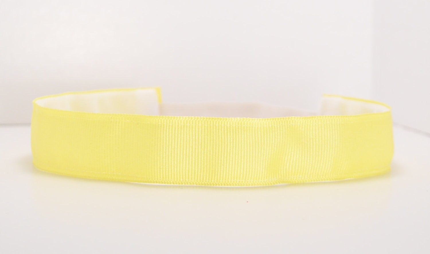 Band-It Headband .... Solid Sunshine Yellow.  Will stay put and not slip.