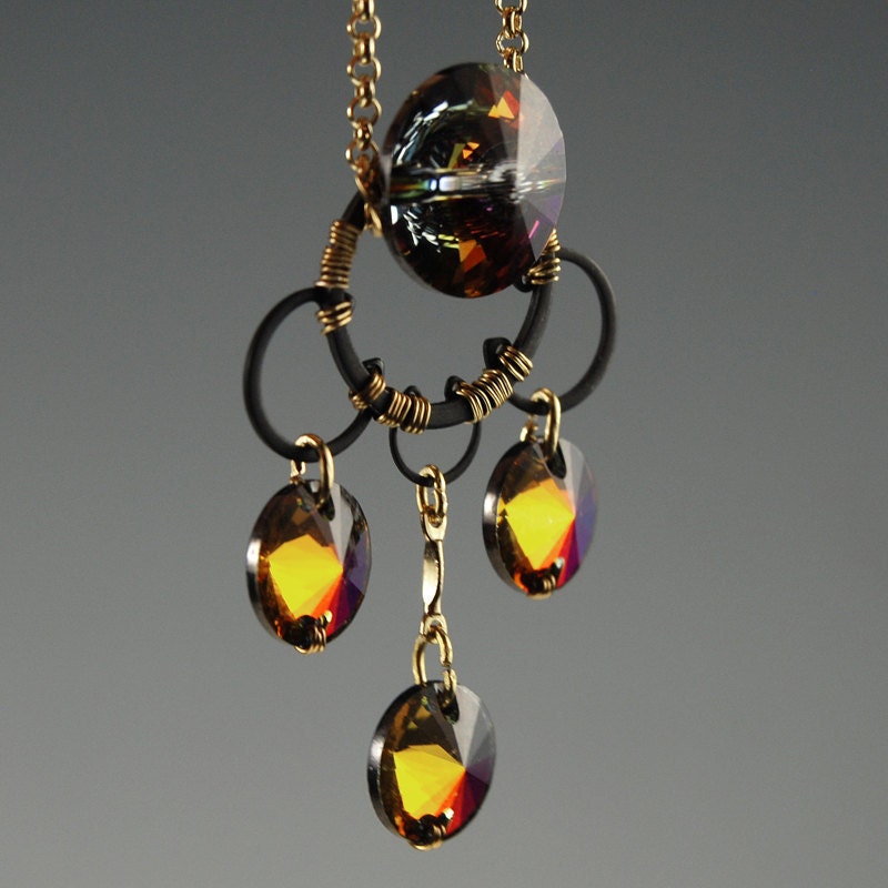 Venus v5: Wire wrapped industrial pendant with volcaono Swarovski crystals