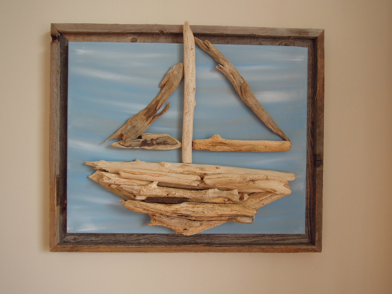 Driftwood Sailboat on  light blue and tan painted canvas with rustic frame 16x20 (19x23 with frame)