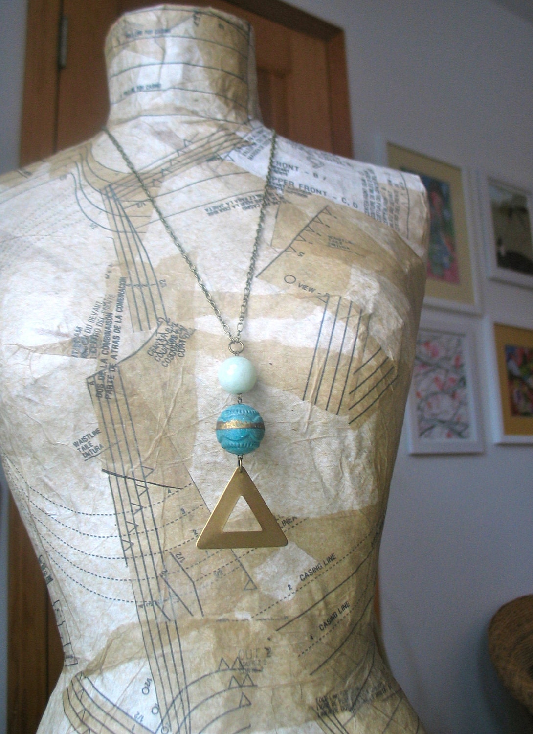 long cut out triangle necklace with big beads