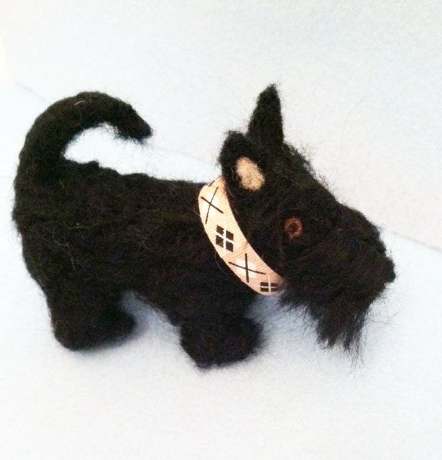 Needlefelted Scottie miniature wearing a pink argyle collar