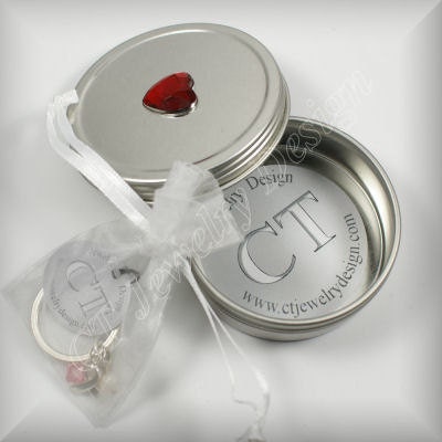 Included With Purchase CT Heart Tin and Organza Pouch Gift Wrapping