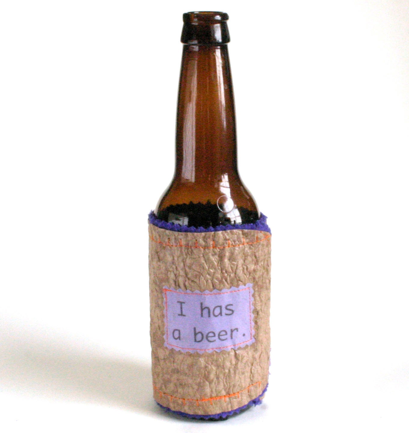 I has a beer Bottle Coozy made from Recycled Plastic Bags
