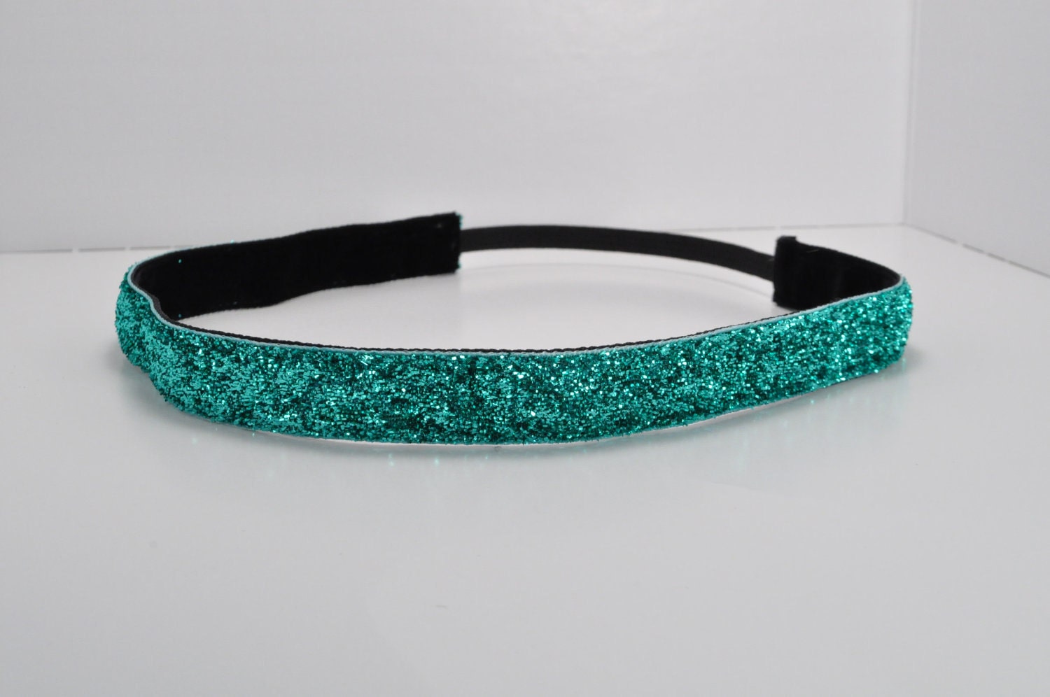 Band-It Headband.... Jade Glitter.  Will stay put and not slip.