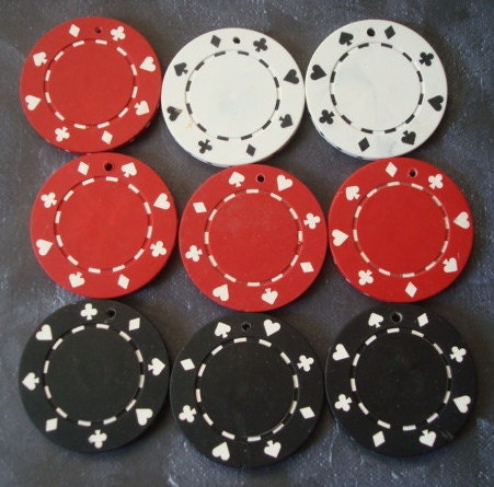 Nine Red Black and White Vintage Poker Chips With Holes