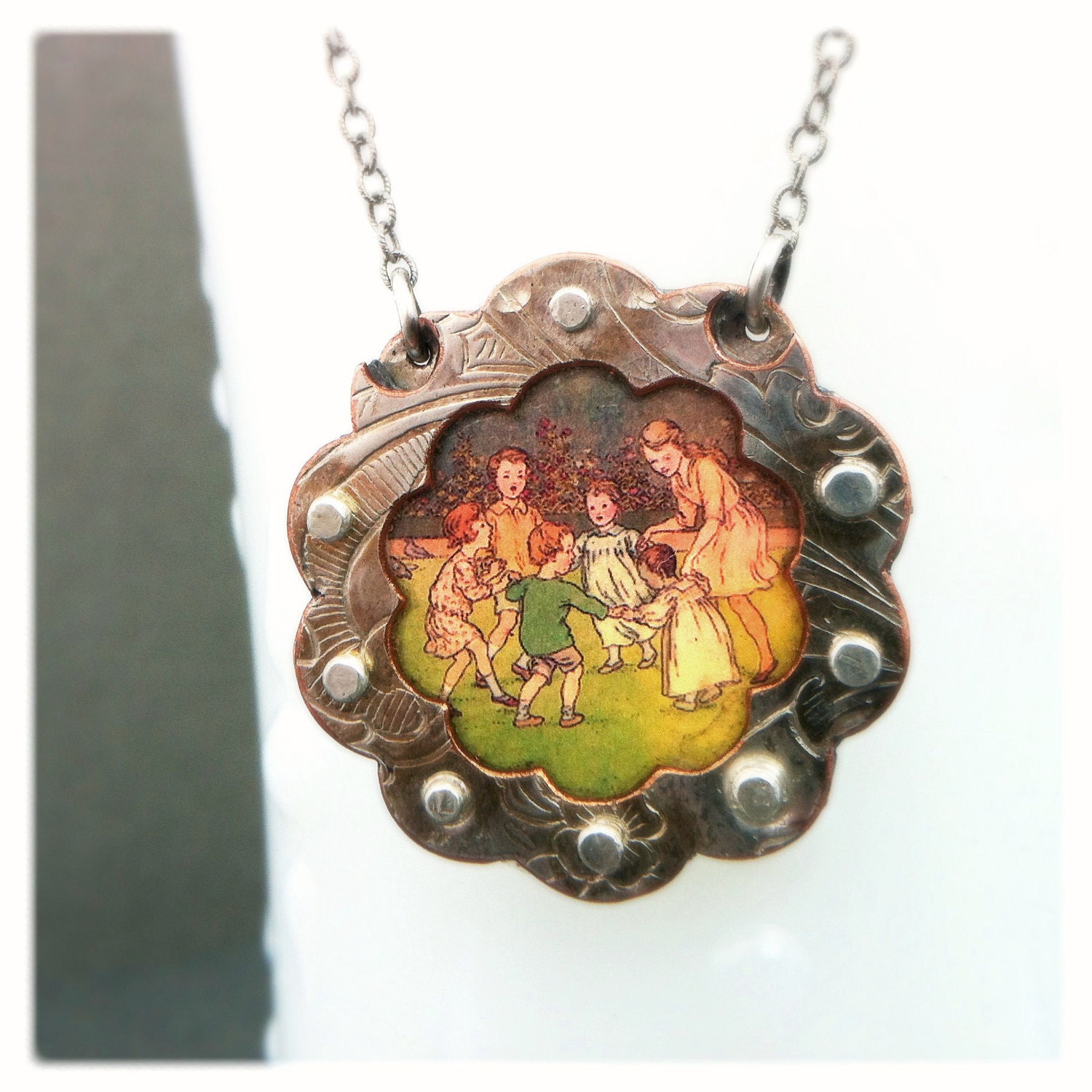 Upcycled Riveted Scalloped Circle Necklace By Roia O'Brien - Vintage Print of Children Playing