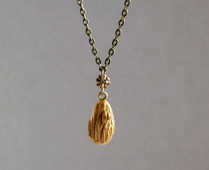 wood tribal necklace pendant. metal bead. brass chain. boho handcrafted jewelry