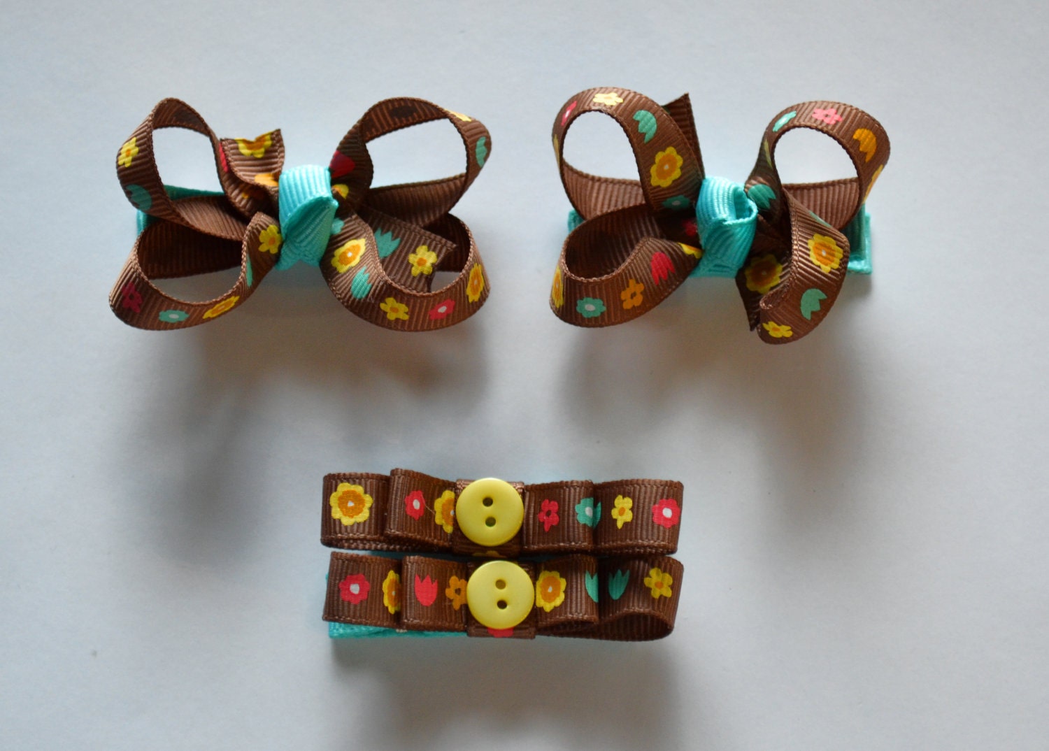 Itty bitty bow clip set. Fun brown floral print