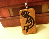 Kokopelli Pendant Southwestern Native American gold black - handmade polymer clay jewelry