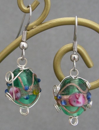 Pink accented Lampworked Glass