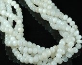 chatoyant White MOONSTONE smooth Rondelle beads 6.5mm African moonstone - 8 inch strand