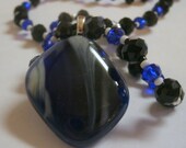 WONDERFULLY DRAMATIC Handfused glass pendant and crystal necklace Black and blue - MissysTreasurez WONDERFULLY DRAMATIC Handfused glass pendant and crystal necklace Black and blue - MissysTreasurez