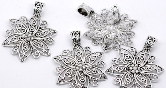 1 Large Antique Silver Flower Pendant. Large Bail to fit on most chains. Will fit on Pandora Style Necklaces. Ships from the USA.
