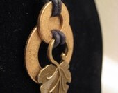 urban artifact necklace - bronze washers, antiqued brass leaf jewelry component