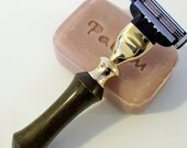 Hand-turned verawood razor