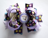 Purple Dr. Seuss cat in the hat Bottlecap hair bow.