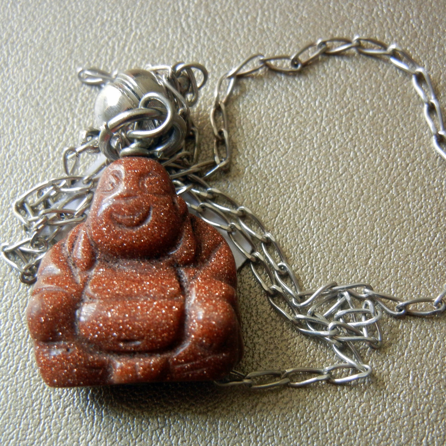 Goldstone Buddha pendant- silver chain, magnetic clasps
