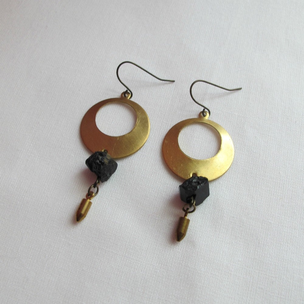 brass circle, rock, and bullet earrings
