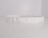 Band-It Headband....White Glitter.  Will stay put and not slip.