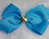 Sail away with this blue bow with accent anchor