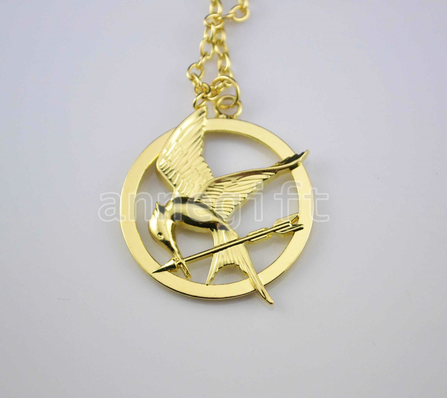Hunger Games Logo Pendant  Gold  Necklace Inspired ,arrow Necklace
