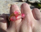 Wrapped Ring. Rosy Glow Czech glass on Merlin's gold size 7 us