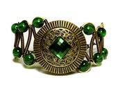 Bracelet - Victorian Era Antique button with green square glass jewel Circa 1900s