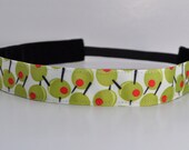 Band-It Headband .... Olives.  Will stay put and not slip.