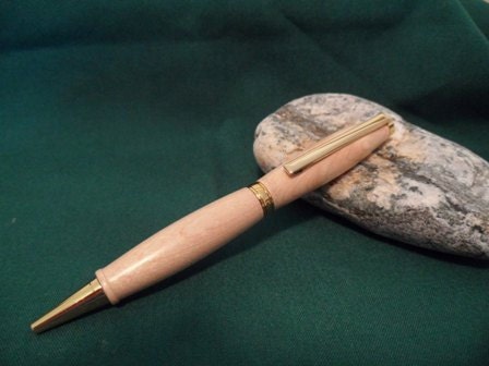 Handcrafted birdseye maple pen