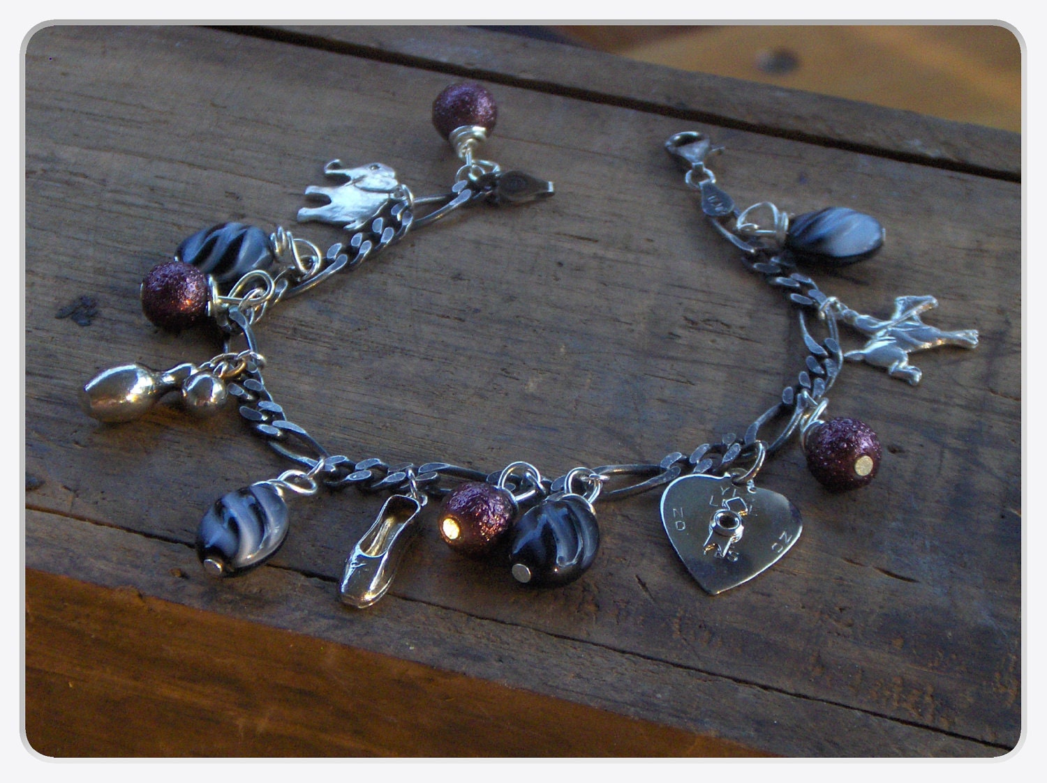 The Littlest Circus. Sterling Silver Charm bracelet. Upcycled vintage elephant, ballet shoe, pony, heart, bowling pin and ball charms