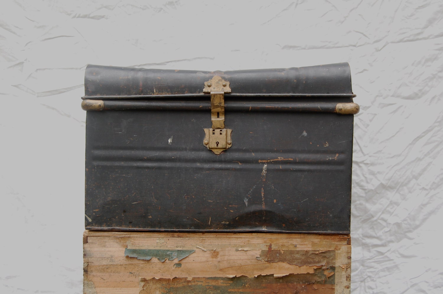 vintage metal trunk painted black