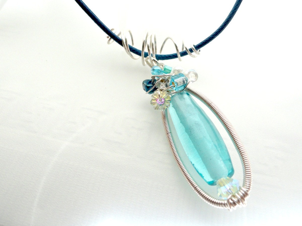 Aqua Blue Statement Necklace with Silver Coiled Frame