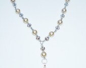 Round almond pearl necklace with smoky glass faceted pendant