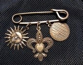 Vintage Pin with Sun, Fleur de lis, and Amour Charms