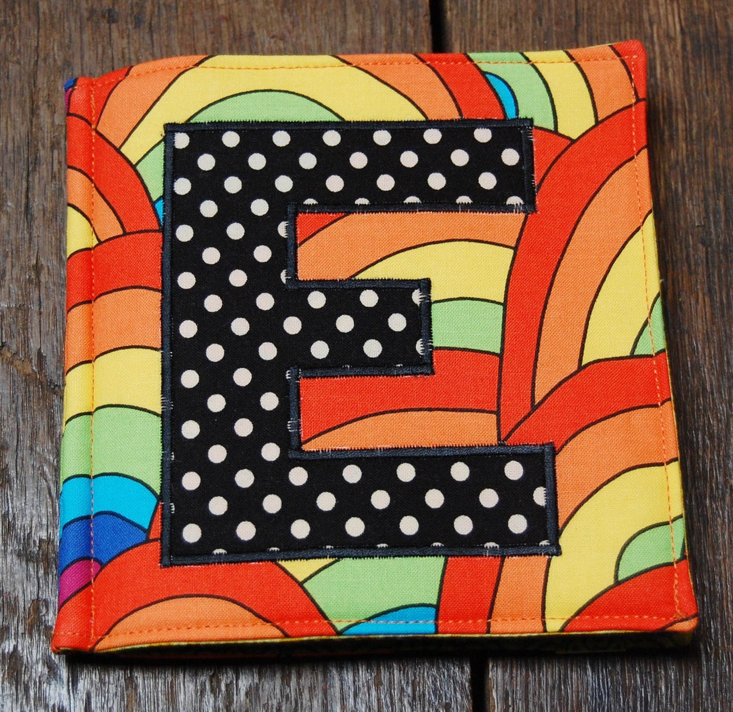 Custom cloth book with embroidered words, 8 page monogram