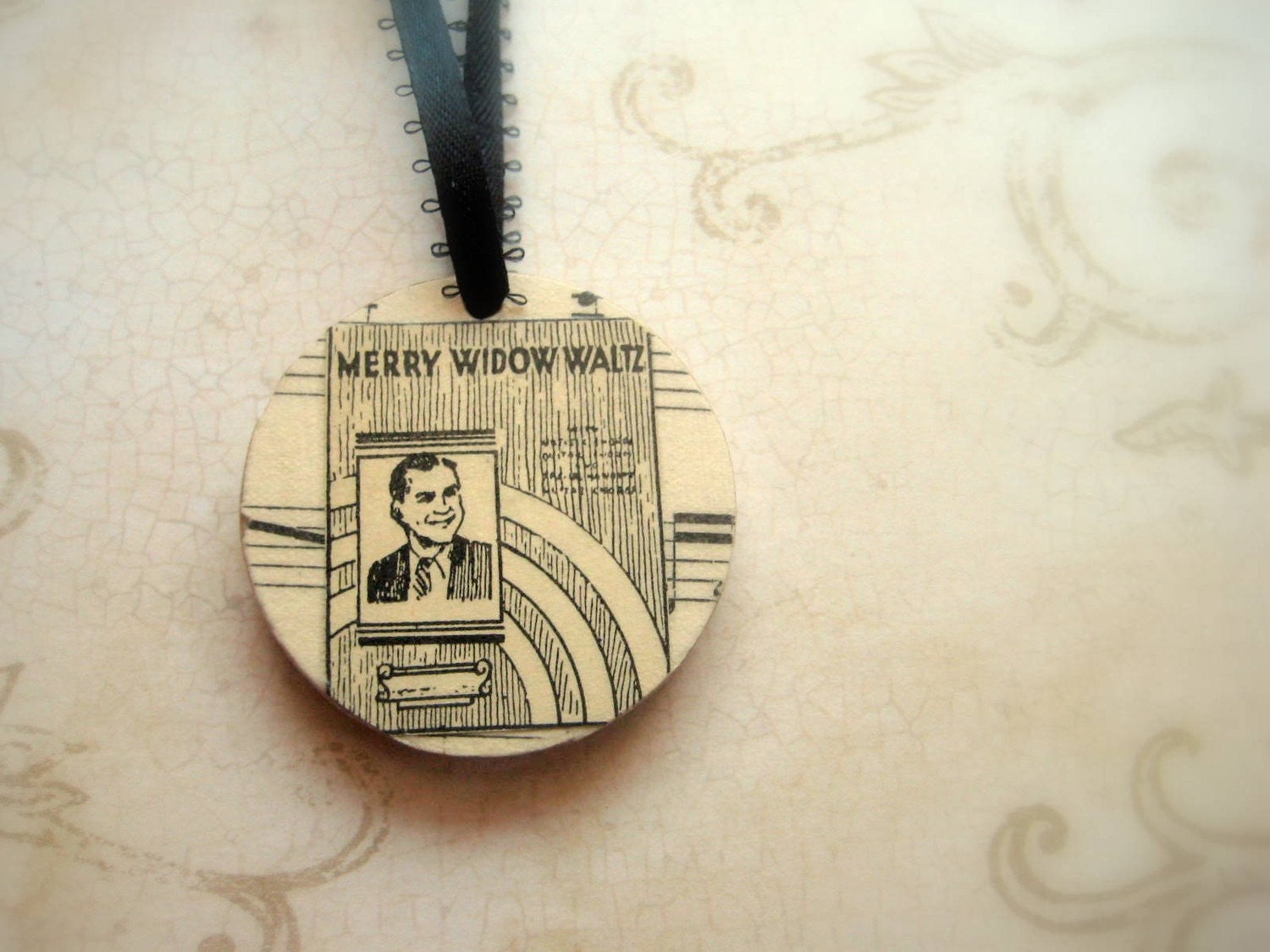 Merry Widow Waltz decoupaged wooden ornnament with vintage sheet music. One of a kind handmade Christmas ornament