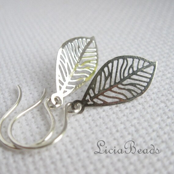 Disintegrate - silver veined leaf earrings