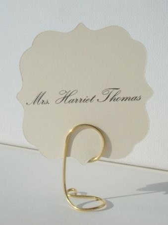 A simple metal placecard holder for wedding reception tables and formal