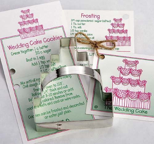 The cutter comes with recipes for Wedding Cake Cookies and Frosting on a 