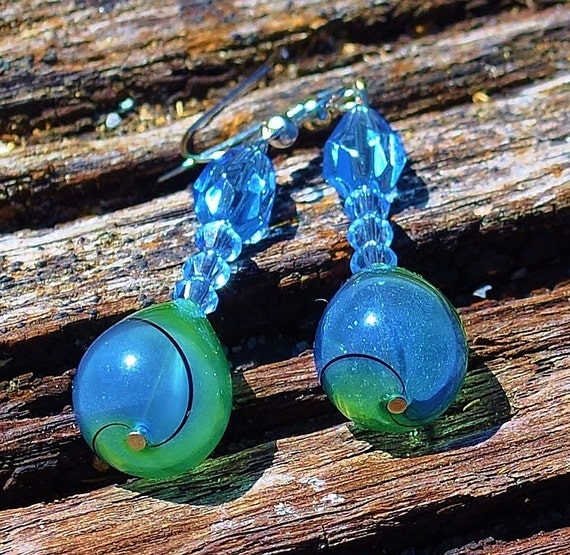 Wwirled glass dangle earrings in blue and green