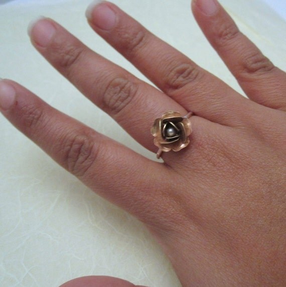 Rose cocktail ring worn
