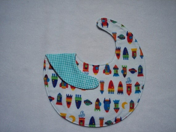 Baby bib, four soft layers, reversible, white with colorful space ships