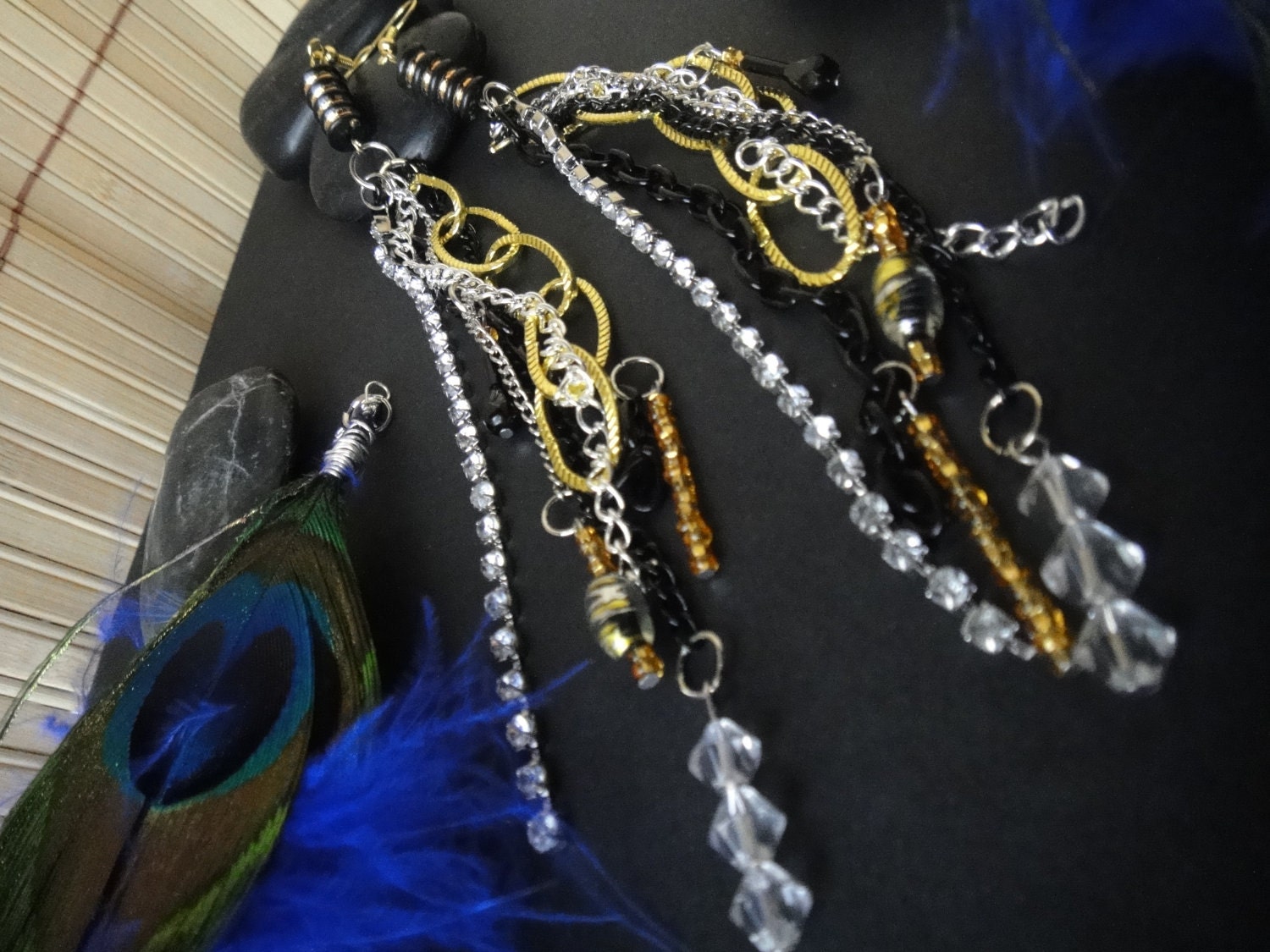 ON SALE Peacock feather earrings with black, gold, silver and rhinestone chain