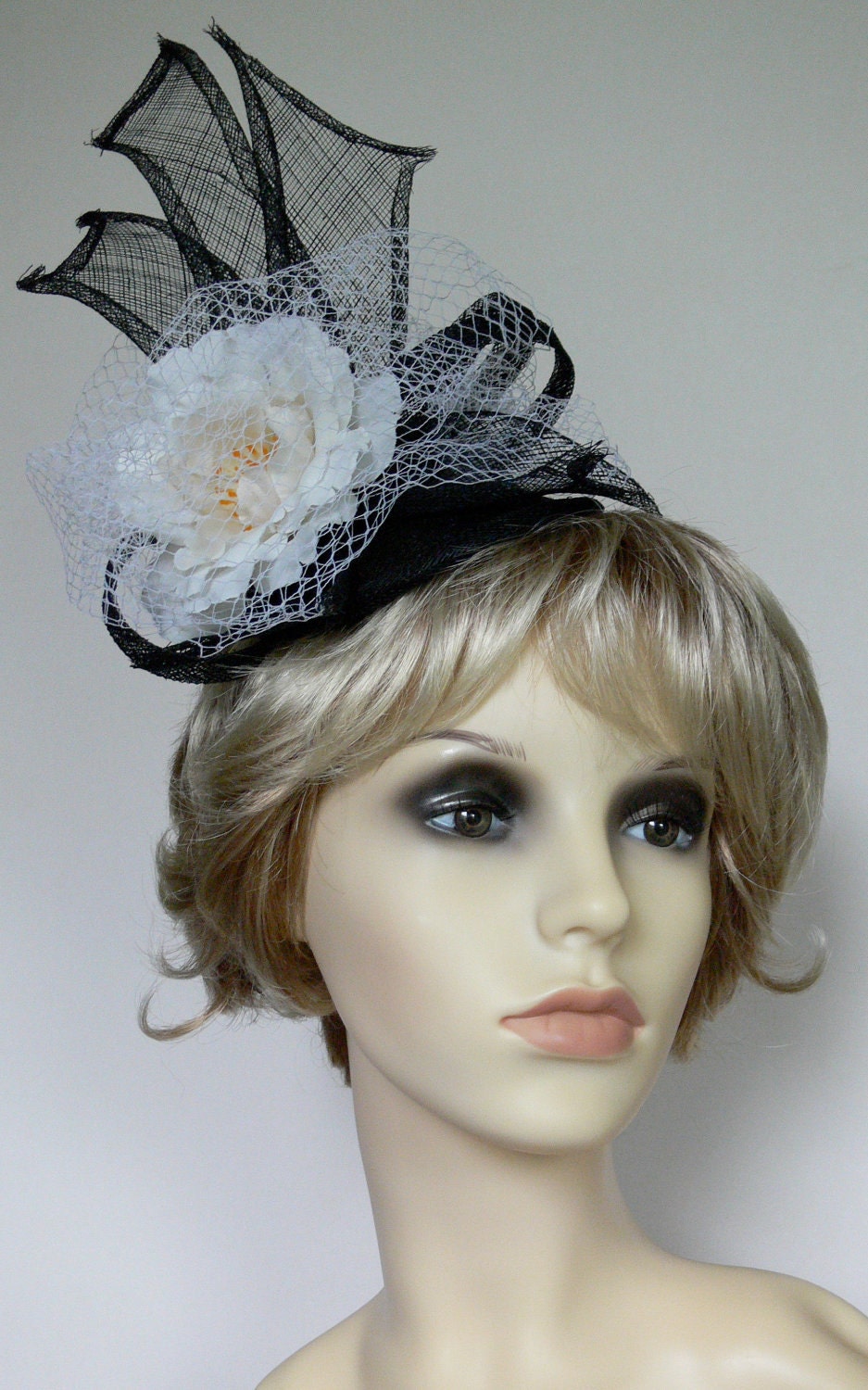 Fascinator, black and white with flower