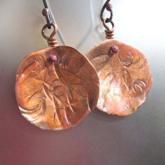 hammered and textured copper disk earrings in sterling silver