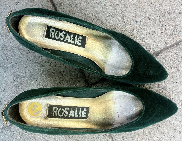 green velvet heels with gold bows on back