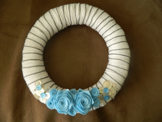 White Yarn Wreath with Blue Flowers and Buttons