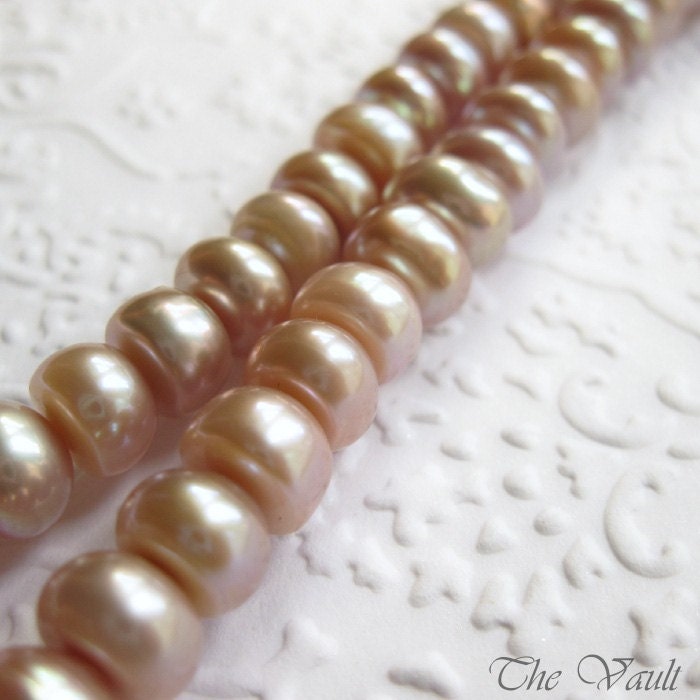 8mm pink freshwater pearls, center drilled buttons, full strand 15 inches, last one